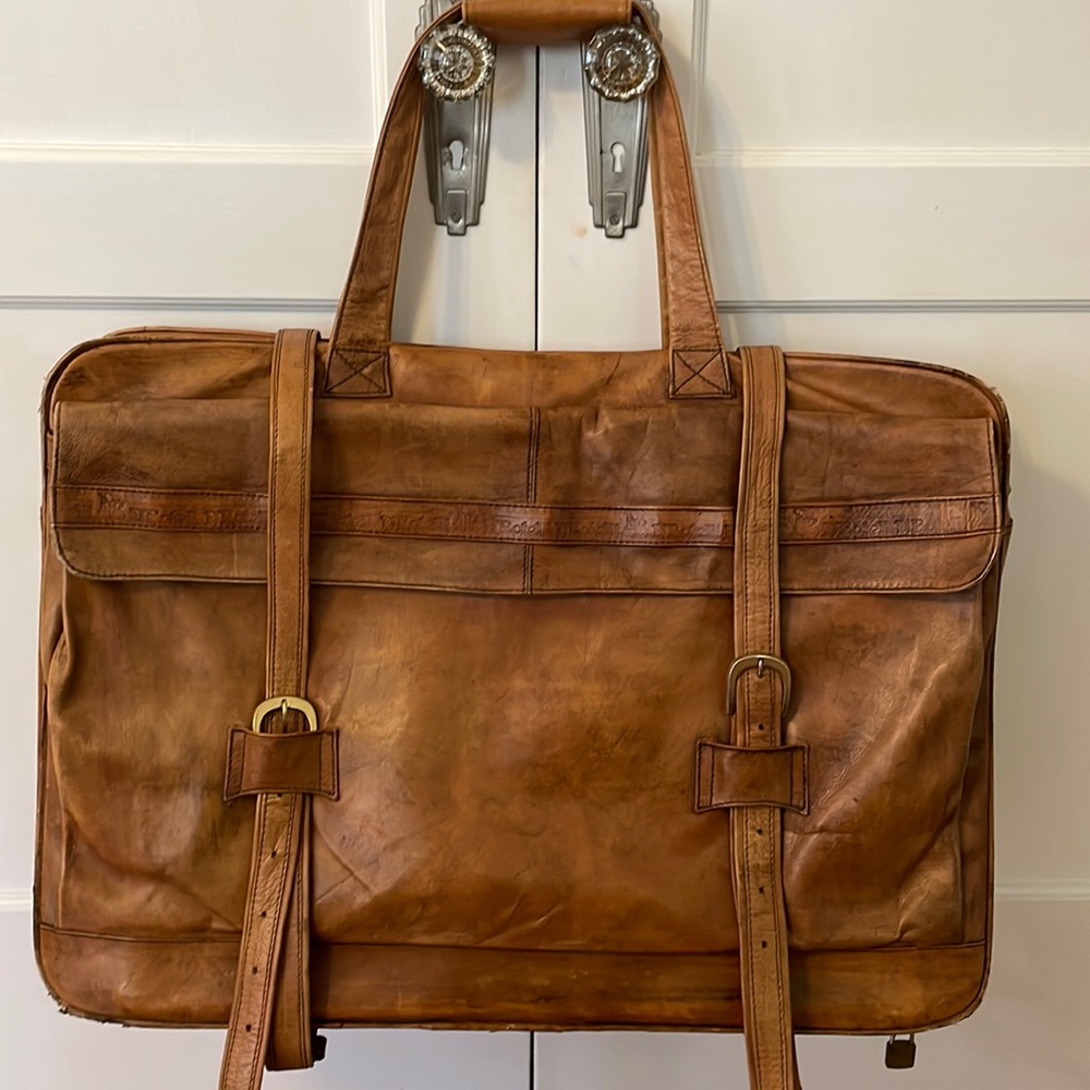Extra large, vintage leather duffle bag.